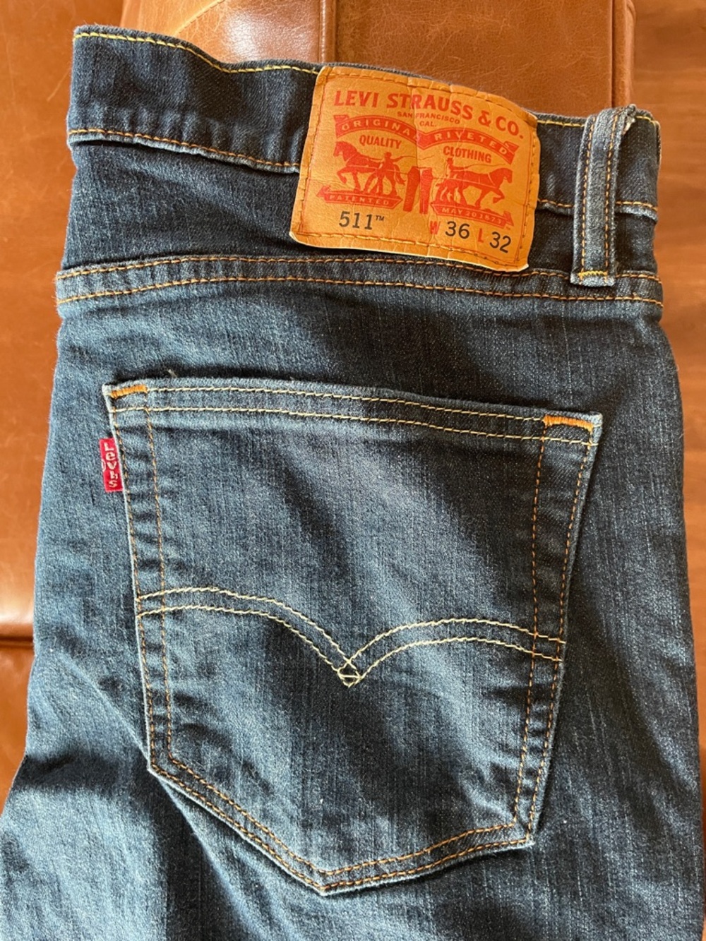 Levi's 511 Slim Straight Jeans in Dark Indigo with Tan Patch